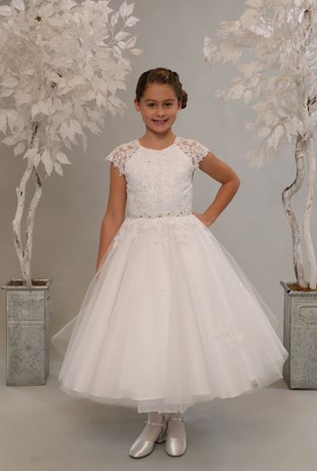 Stunning first holy communion dress has lace cap sleeves and bodice with rhinestone waist detail